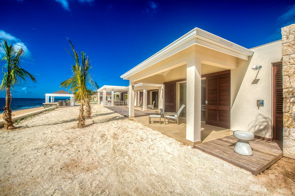 Luxury Beach Front Villa rental -Bedroom and terrace 1
